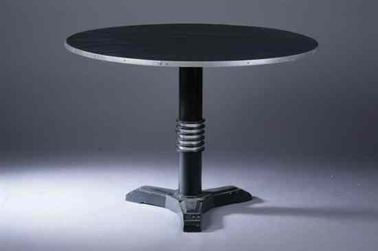 Appraisal: AMERICAN MID-CENTURY MODERN BLACK-LAMINATE DINETTE TABLE 's Round top having