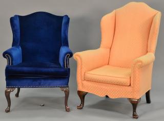 Appraisal: Two upholstered wing chairs Two upholstered wing chairs