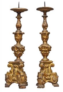 Appraisal: A Pair of Venetian Baroque Carved and Gilded Pricket Sticks