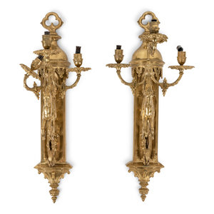 Appraisal: A Pair of Gothic Style Brass Three-Light Sconces Late th