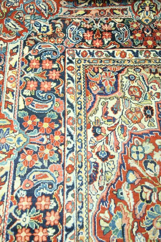 Appraisal: ORIENTAL RUG Multi colored floral decoration on a maroon ground