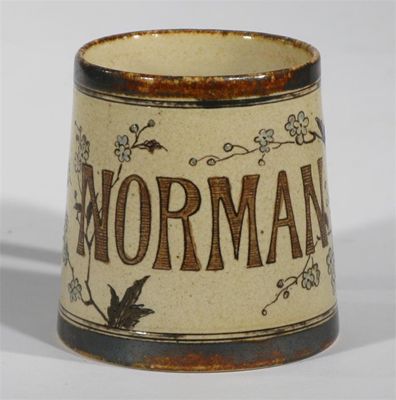 Appraisal: Norman' a Martin Brothers stoneware mug incised with incised with