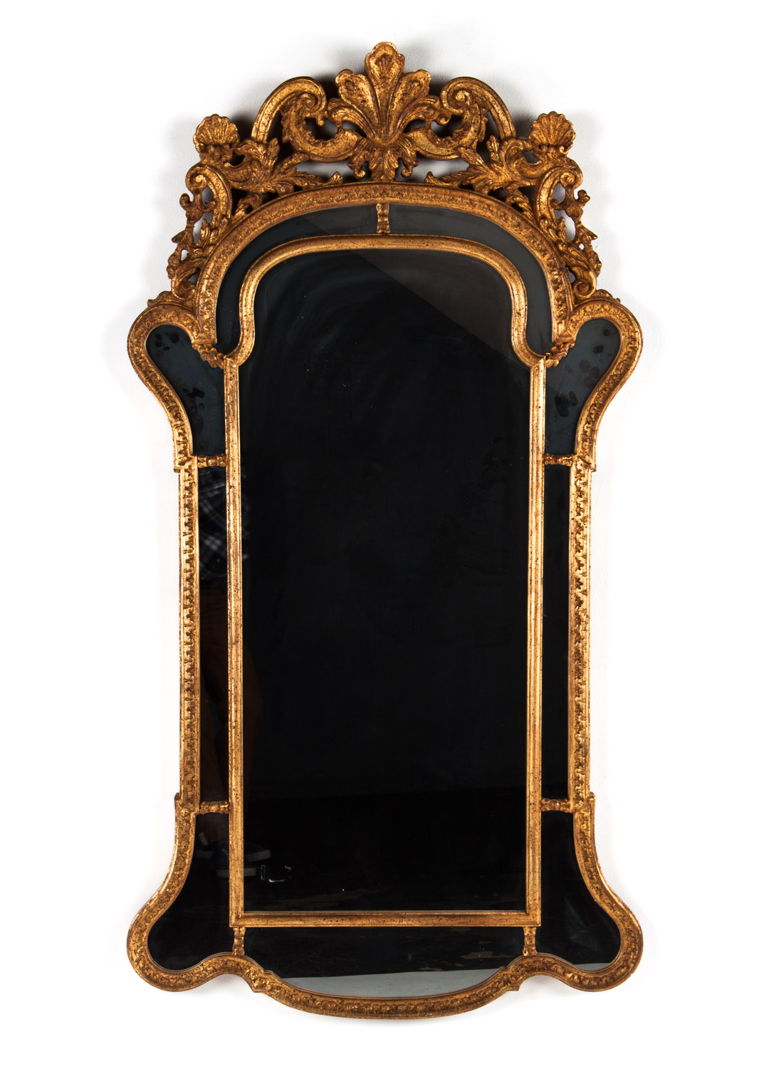 Appraisal: Louis XIV style giltwood looking glass shell and foliate carved