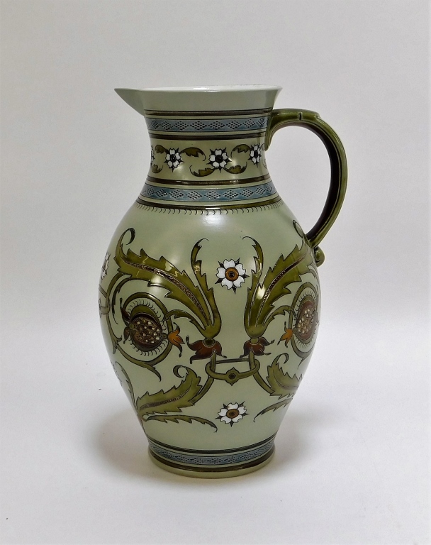 Appraisal: GERMAN METTLACH FLORAL RELIEF STONEWARE PITCHER Germany th CenturyRelief and