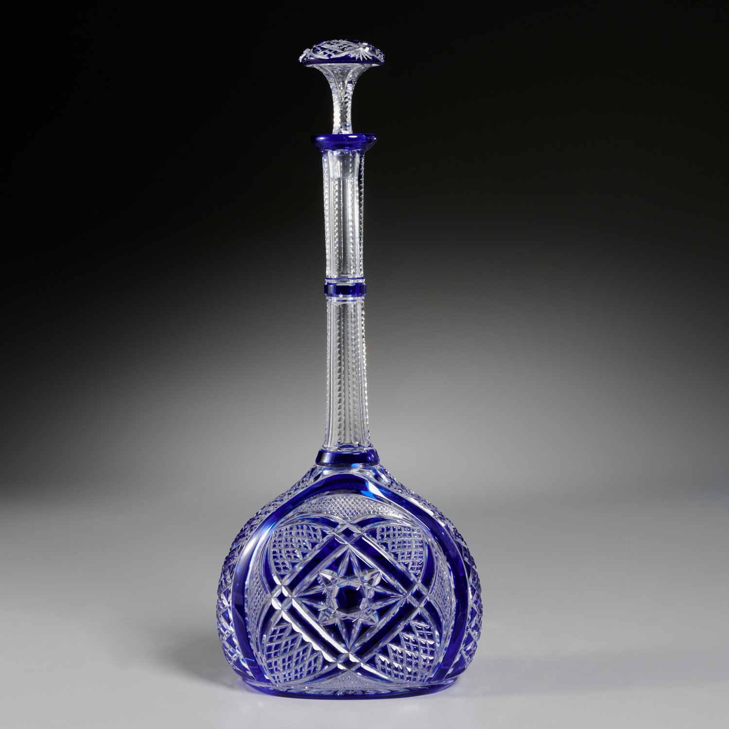 Appraisal: BACCARAT GLASS LONG-NECKED DECANTER BOTTLE th c France blue and