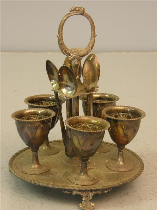 Appraisal: Victorian silver plated egg cup and spoon stand for five