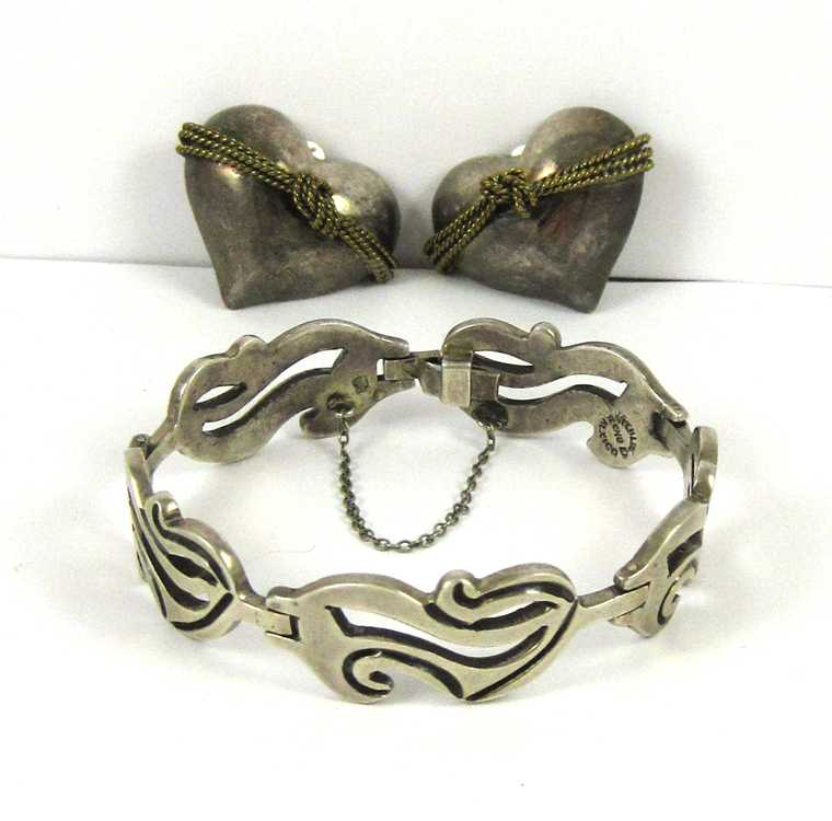 Appraisal: THREE ARTICLES OF MEXICO STERLING JEWELRY including a pair of