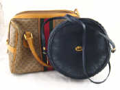 Appraisal: A leather and fabric hand bag by Gucci together with