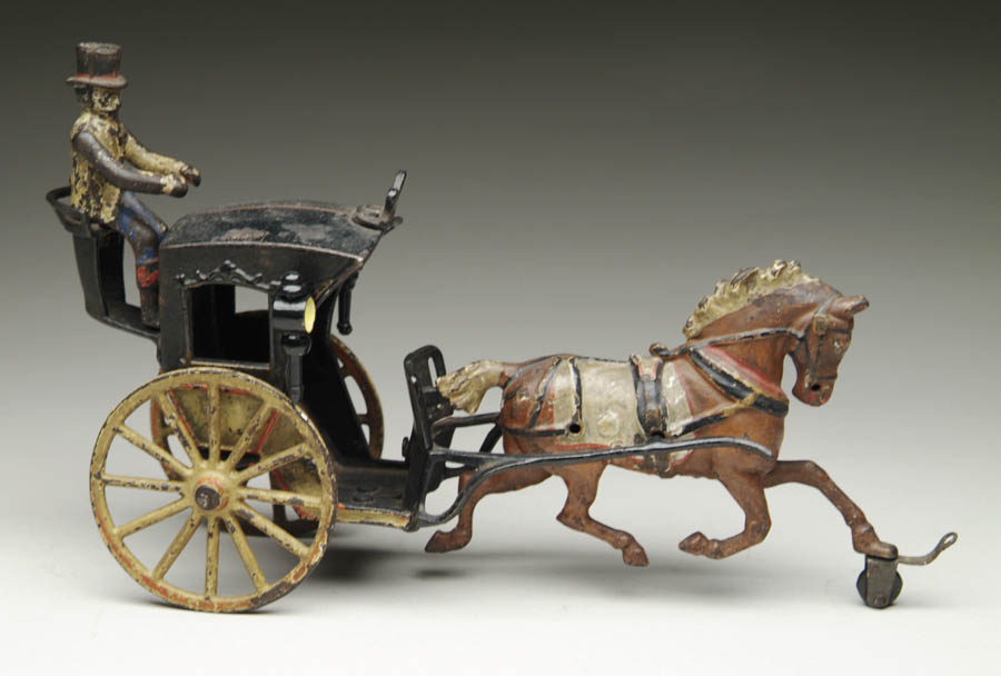 Appraisal: PRATT LETCHWORTH HANSOM CAB Black cab with yellow wheels and