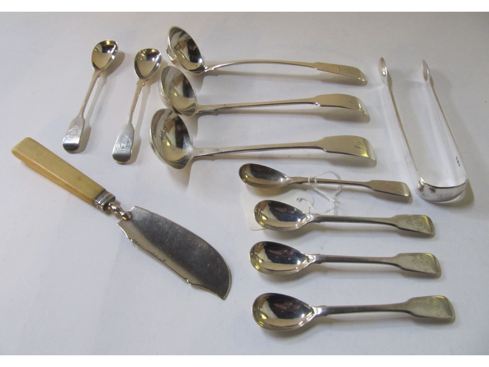 Appraisal: A lot comprising a pair of silver sauce ladles London