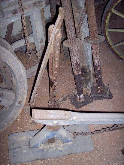 Appraisal: An iron cart jack and a wooden example