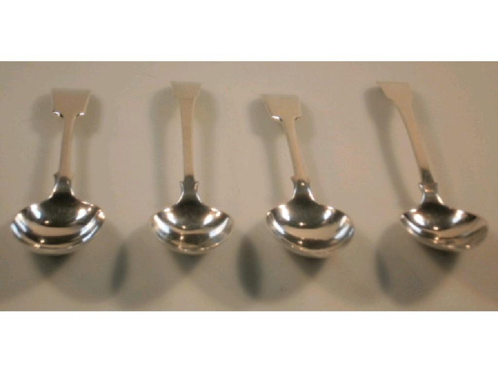 Appraisal: A pair of George III silver fiddle pattern serving spoons