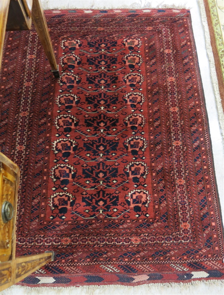 Appraisal: AN AFGHAN BELOUCHI TRIBAL AREA RUG centering a rectangular panel