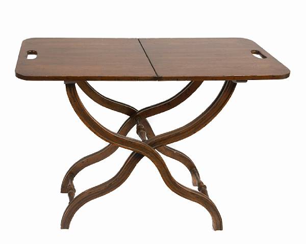 Appraisal: A mahogany coaching table together with a small walnut footstool