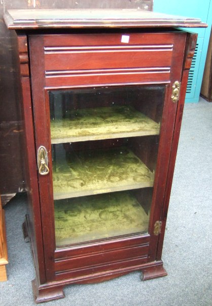 Appraisal: A th century mahogany coal purdonium with gallery top above