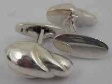 Appraisal: Georg Jensen a pair of silver cufflinks Jensen and English