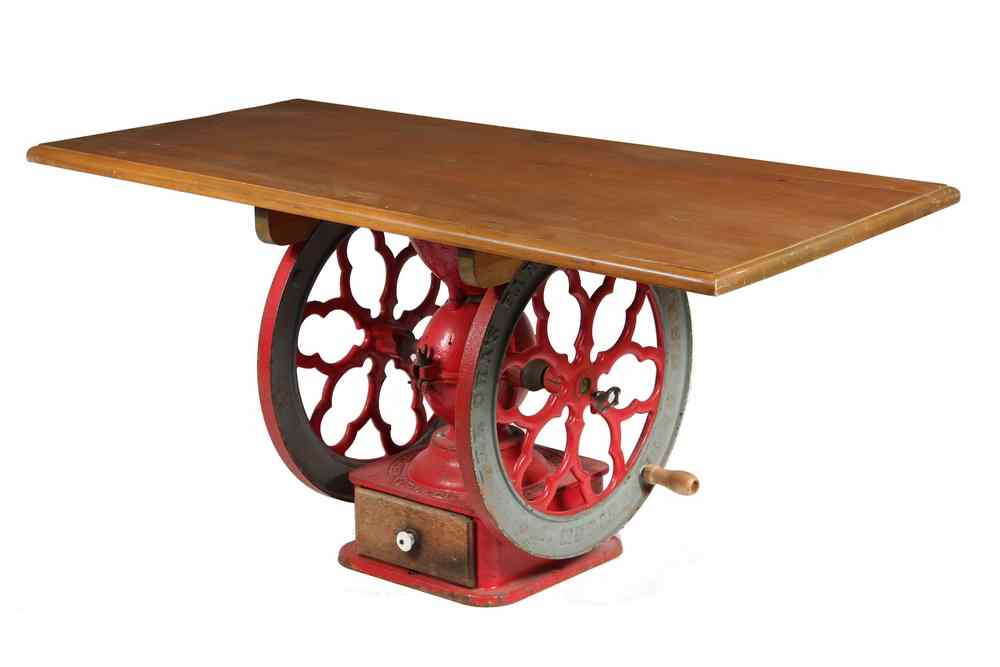 Appraisal: COFFEE GRINDER BASED TABLE - Coffee Table made up from