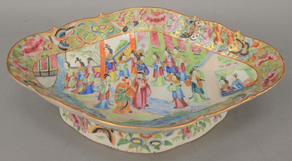 Appraisal: Famille Rose footed dish having painted courtyard central scene with