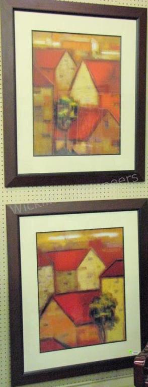 Appraisal: A pair of framed decorator prints depicting Euro villages with