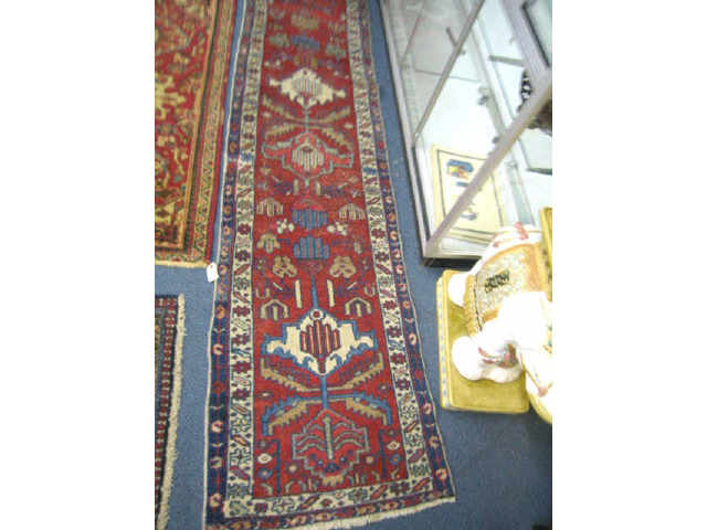 Appraisal: Heriz Persian Handmade Runner stylized floral design on red field