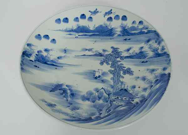 Appraisal: Japanese Blue and White Charger Japan A heavily potted blue