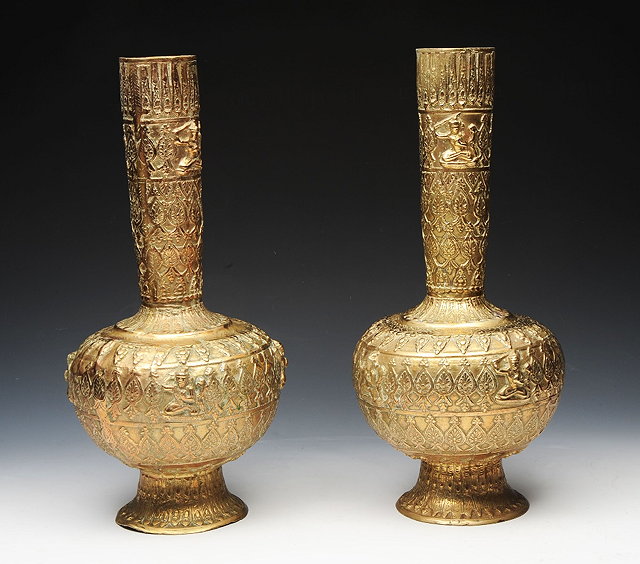 Appraisal: A PAIR OF INDO-PERSIAN BRASS BALUSTER VASES cm high