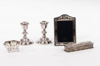 Appraisal: A pair of silver desk candlesticks B Co Birmingham of