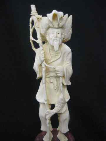 Appraisal: Chinese Carved Ivory Figurine of a Fisherman with large hat