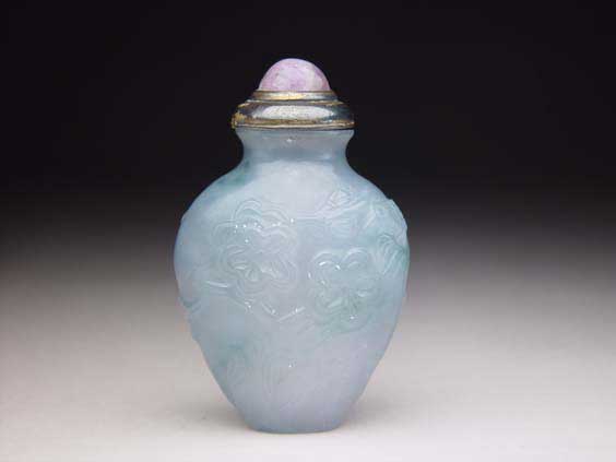 Appraisal: ANTIQUE JADEITE SNUFF BOTTLE Finely hollowed and antique carved translucent