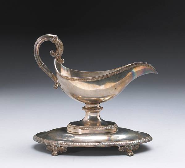 Appraisal: A French standard silver sauce boat with standGabriel-Jacques-Andre Bompart Paris