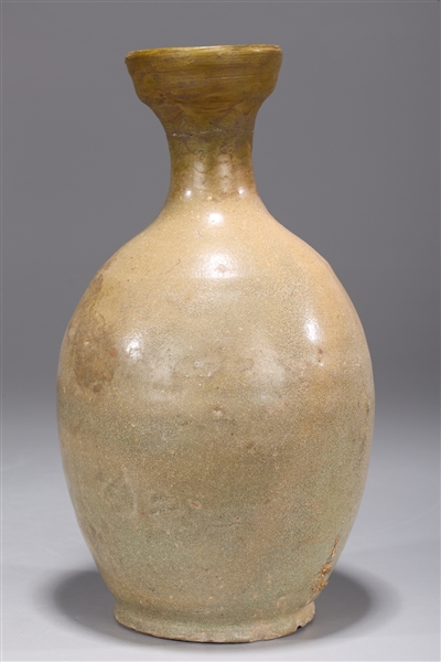 Appraisal: Early Korean Yi Dynasty bottle-vase with a celadon glaze chipped