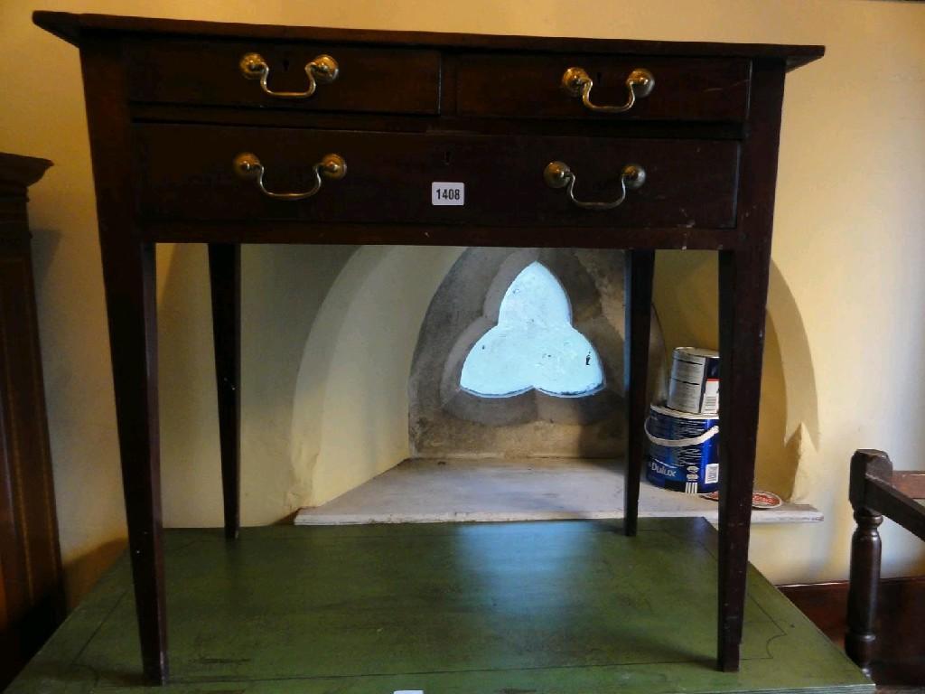 Appraisal: A th century mahogany side table fitted with one long