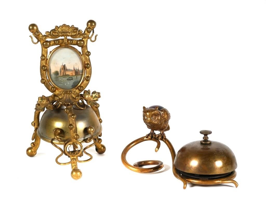 Appraisal: Two unique brass desk or counter bells The first bell