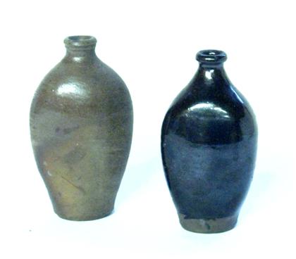 Appraisal: Two redware flasks th century One with red brown glaze