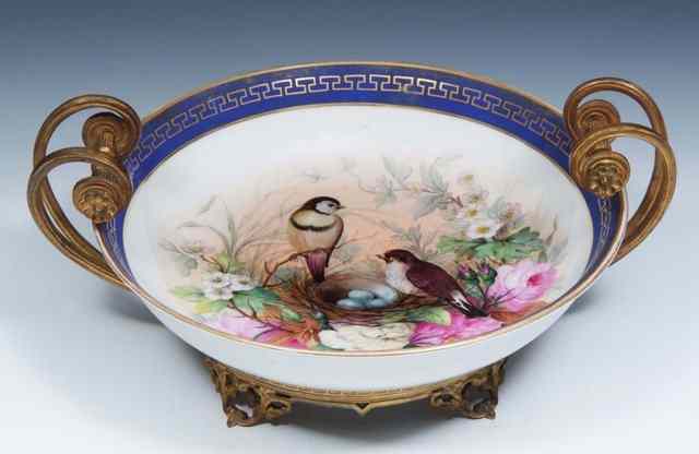 Appraisal: A BERLIN KPM PORCELAIN BOWL painted with two birds above