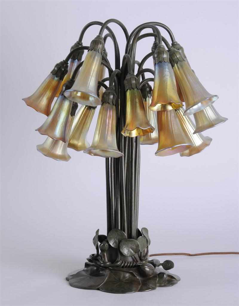 Appraisal: TIFFANY STUDIOS PATINATED BRONZE AND FAVRILE GLASS EIGHTEEN-LIGHT LILY LAMP