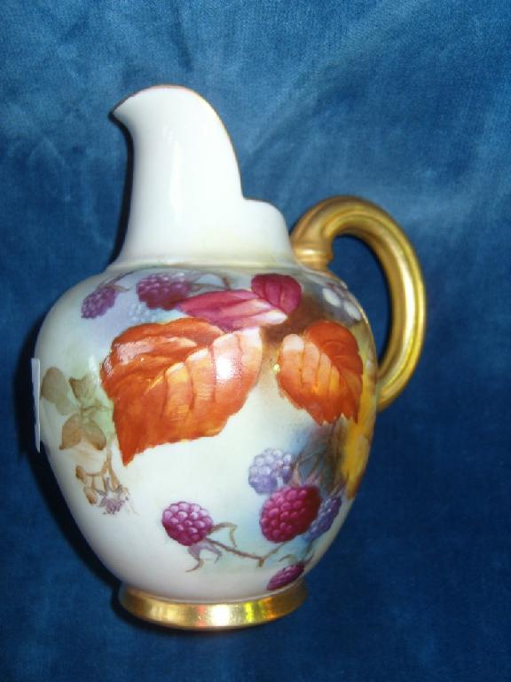 Appraisal: A Royal Worcester cream ground flat back jug with painted