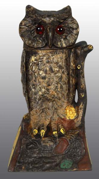 Appraisal: Cast Iron Owl Turning Head Mechanical Bank Description Manufactured by