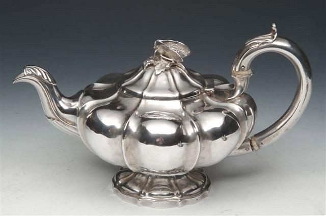 Appraisal: A WILLIAM IV SILVER GOURD SHAPED TEAPOT with matching fluted