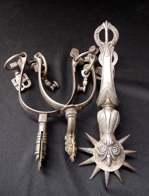 Appraisal: Three silver plated spurs