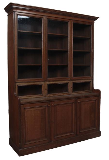 Appraisal: A large late th century oak bookcase the projected dentil