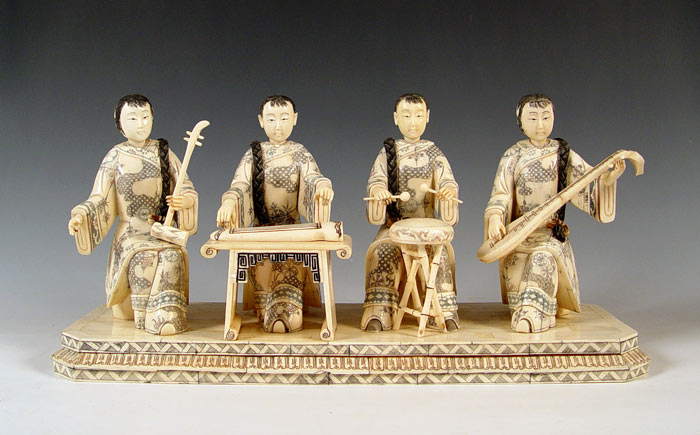 Appraisal: CHINESE BONE CLAD FIGURAL GROUP OF MUSICIANS Detailed scrimshaw Measures