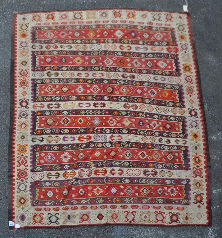 Appraisal: Turkish Kilim in shades of red cream and brown wide