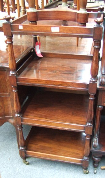 Appraisal: A George IV rosewood whatnot the four rectangular tiers on