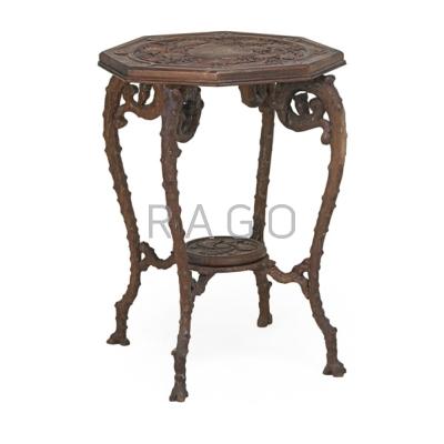 Appraisal: OCTAGONAL OCCASIONAL TABLE Walnut with elaborately carved top and sides