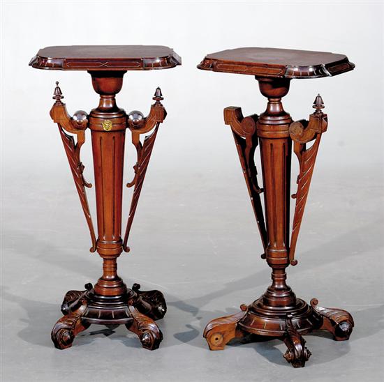 Appraisal: Pair Aesthetic Movement carved mahogany pedestals circa shaped and molded