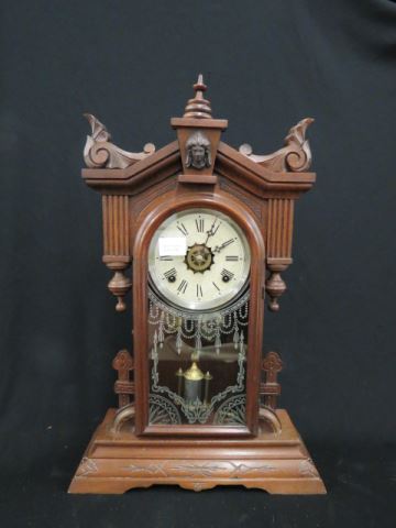 Appraisal: Gilbert Carved Parlor Clock Jenny Lind top silver stenciled glass