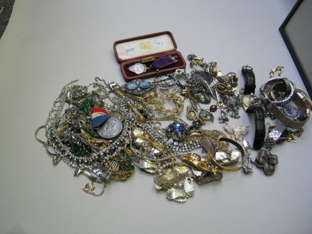 Appraisal: A collection of costume jewellery including necklaces brooches chains pendants