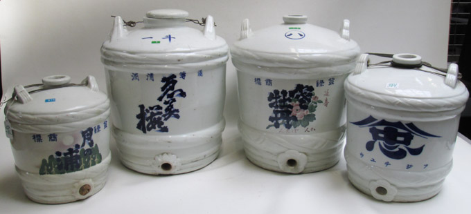 Appraisal: FOUR JAPANESE POTTERY SAKI JUGS each with white glaze and