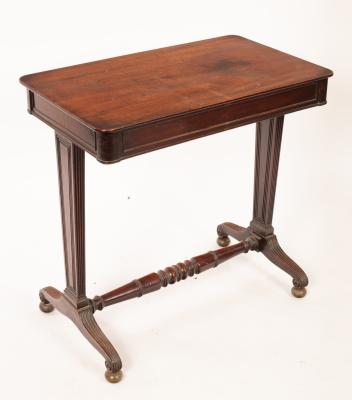 Appraisal: A late Regency mahogany table fitted a drawer and raised